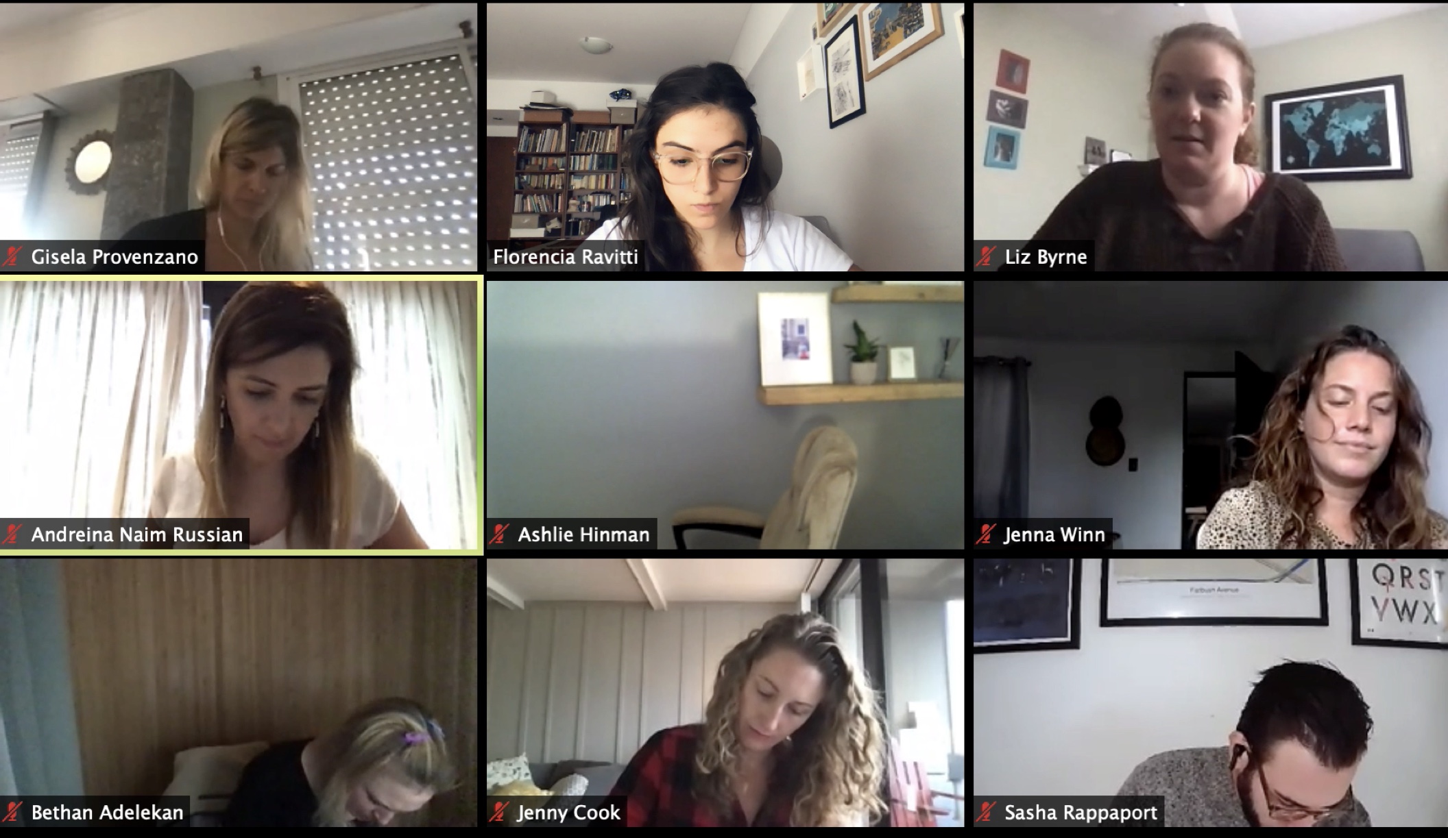 A video call grid of twelve participants in a design thinking session, several holding paper prototypes up to their cameras.